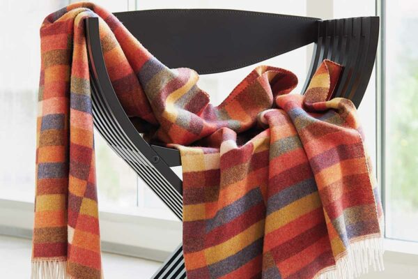 Eagle Products Sevilla Eagle Products Plaid Sevilla auf schwarzem Stuhl