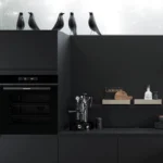 Tiefschwarze elegante Häcker Küche concept130 Perfect Soft 2
