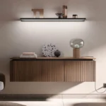 Elegante Häcker Küche systemat AV 6023, mit Rillenoptik, Nussbaum, Sideboard
