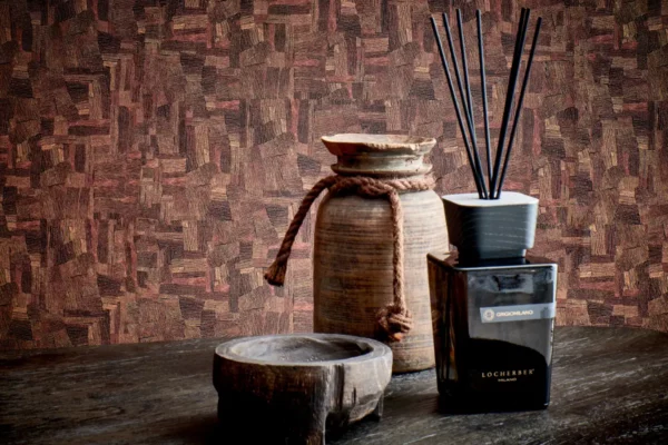 Locherber Milano Raumduft Grigio Milano Diffusor Locherber Milano Raumduft Grigio Milano Diffusor, dunkle Flasche vor dunklem Hintergrund