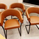 Tecta Stuhlgruppe D9, vier Stühle nebeneinander, Leder